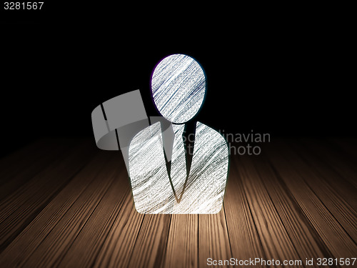 Image of Marketing concept: Business Man in grunge dark room