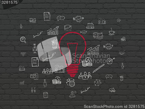 Image of Finance concept: Light Bulb on wall background