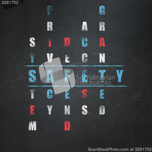 Image of Safety concept: word Safety in solving Crossword Puzzle