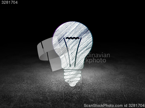 Image of Finance concept: Light Bulb in grunge dark room