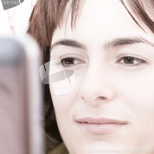 Image of Young woman with laptop 