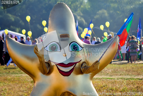 Image of Funny carnival costume in the form of stars at the festival