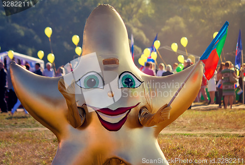 Image of Funny carnival costume in the form of stars at the festival