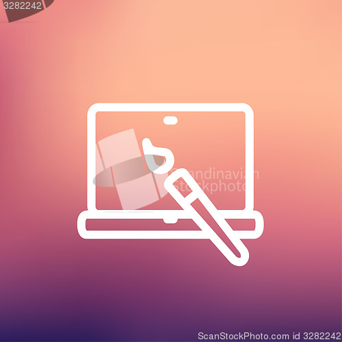 Image of Laptop and pen an editors tools thin line icon