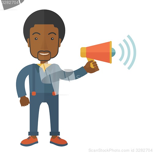 Image of Businessman in the field holding a megaphone.