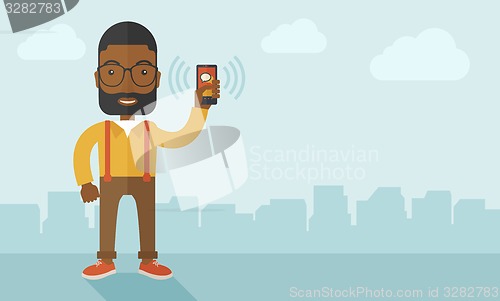 Image of Office worker and his smartphone.