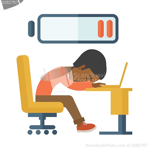 Image of Employee fall asleep at his desk.