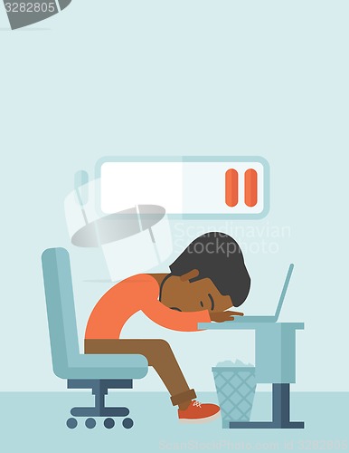 Image of Employee fall asleep at his desk.