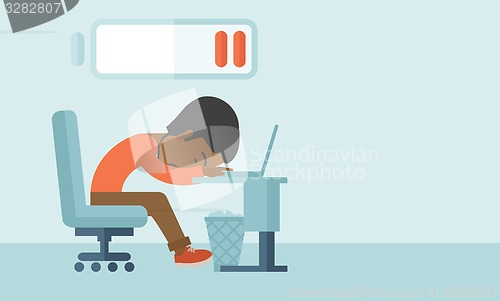 Image of Employee fall asleep at his desk.
