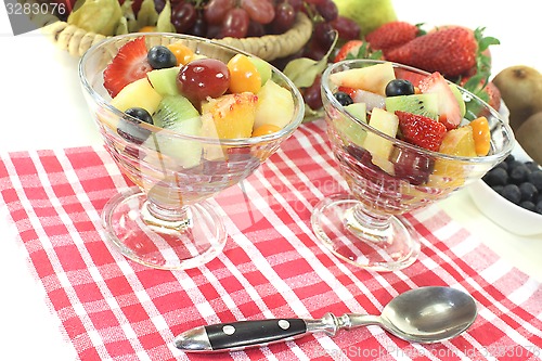 Image of Fruit salad in a bowl on checkered napkin