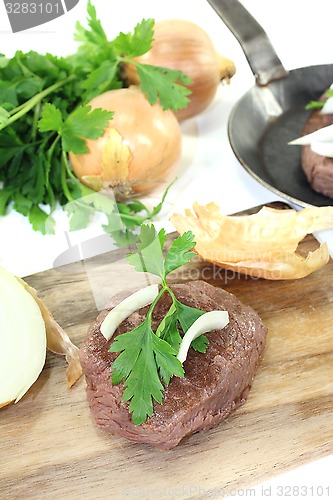Image of Ostrich steaks with smooth parsley