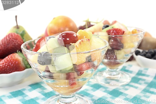 Image of Fruit salad in a bowl on checkered napkin