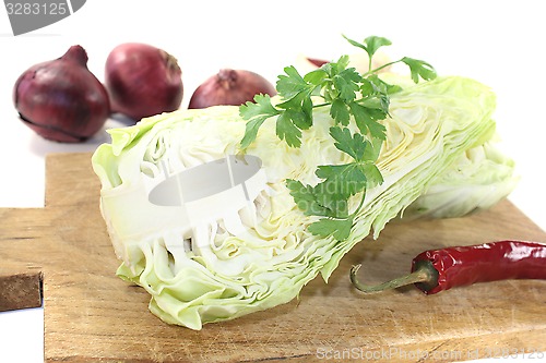 Image of sweetheart Cabbage on a board