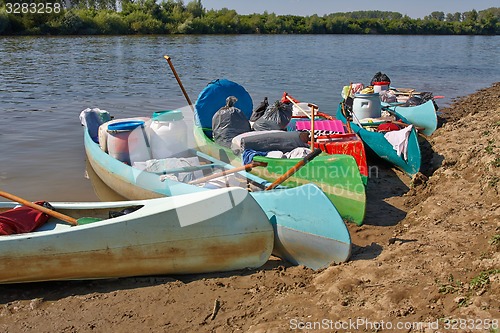 Image of Canoes on the Riverside