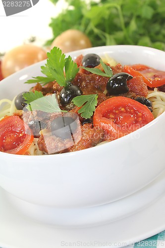 Image of Spaghetti alla puttanesca with parsley