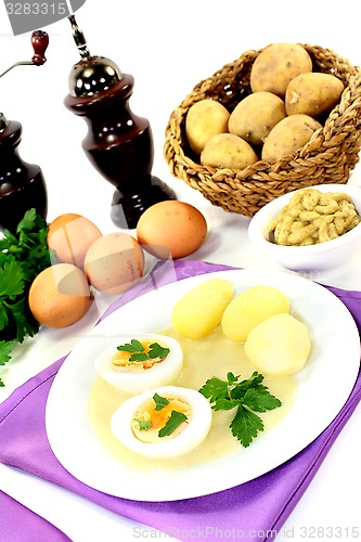 Image of Mustard eggs with potatoes