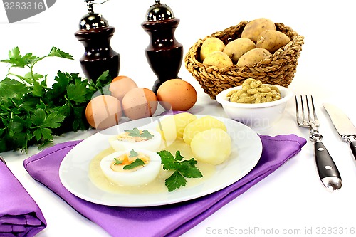 Image of boiled eggs with mustard potatoes