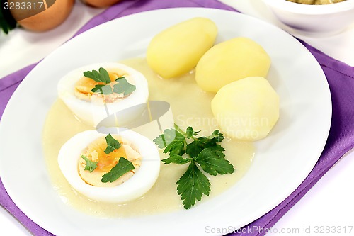 Image of Mustard eggs with cooked potatoes