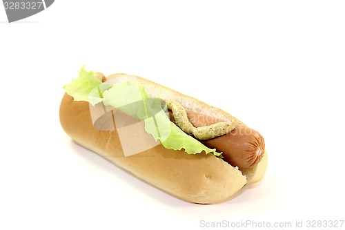 Image of Hot dog with lettuce leaf