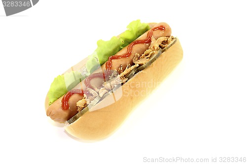 Image of Hot dog with fried onions and ketchup