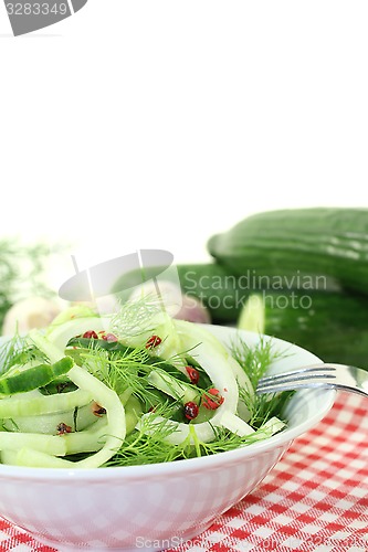 Image of Spaghetti cucumber with red pepper and onions