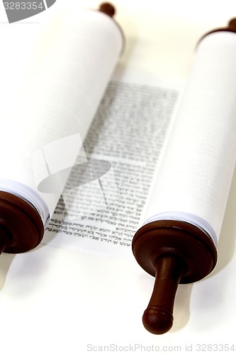 Image of white Torah scroll