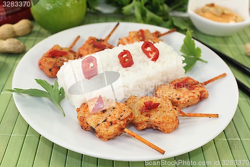 Image of Asian sate skewers with rice