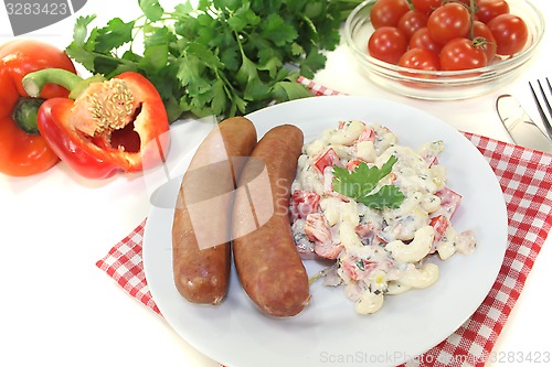 Image of pasta salad and Mettenden with parsley