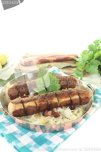 Image of Brawurst with Sauerkraut and potatoes