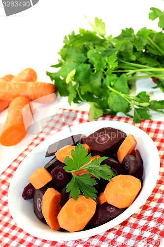 Image of colorful carrots with parsley