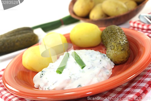 Image of Potatoes with curd and pickles