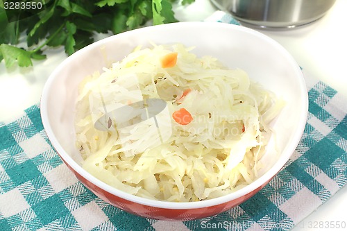 Image of fresh sourcrout in a red bowl