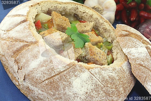 Image of fresh Bread soup with greens