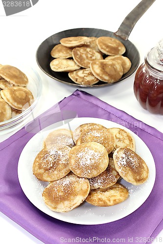 Image of Poffertjes with powdered sugar