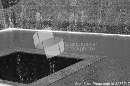 Image of 9/11 memorial fountain in black and white