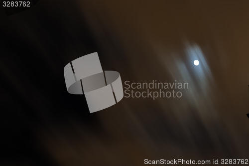 Image of Moving clouds by the moon