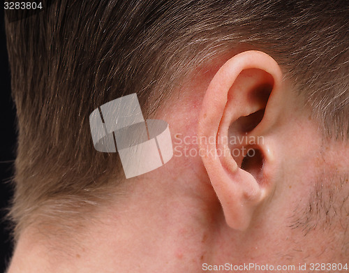 Image of Ear of caucasian male person at closeup