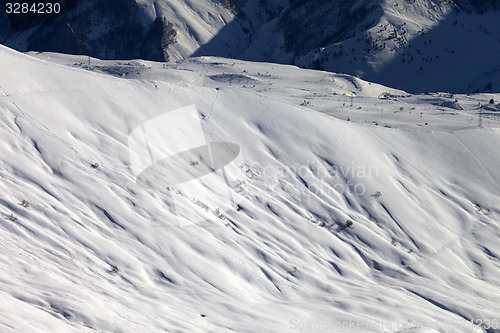 Image of Top view on off-piste slope at evening