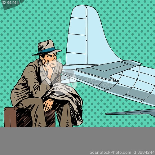 Image of Male passenger waiting for a flight at the airport travel trip s