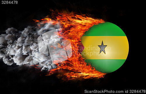 Image of Flag with a trail of fire and smoke - Sao Tome and Principe