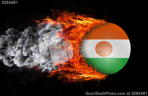 Image of Flag with a trail of fire and smoke - Niger