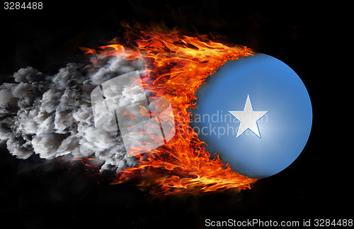 Image of Flag with a trail of fire and smoke - Somalia