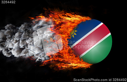 Image of Flag with a trail of fire and smoke - Namibia