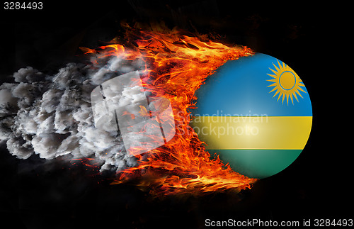 Image of Flag with a trail of fire and smoke - Rwanda