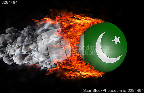 Image of Flag with a trail of fire and smoke - Pakistan