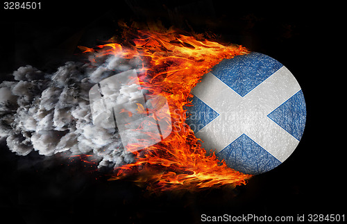 Image of Flag with a trail of fire and smoke - Scotland