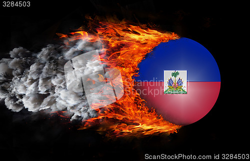 Image of Flag with a trail of fire and smoke - Haiti