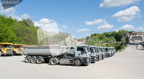 Image of trucks in a quarry