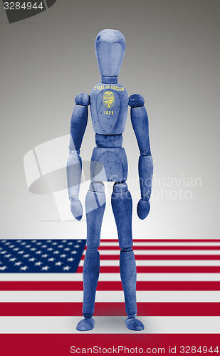 Image of Wood figure mannequin with US state flag bodypaint - Oregon
