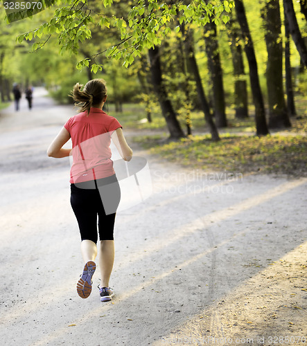 Image of Young female jogger